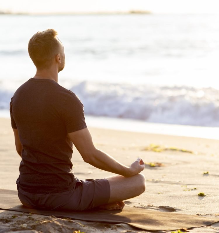 back-view-man-relaxing-beach-outside